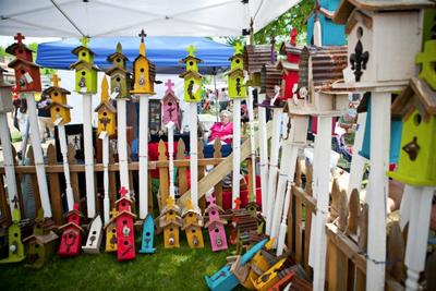 brightly painted bird feeders