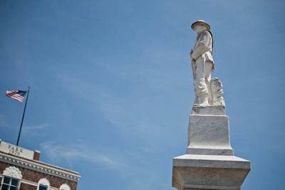 closeup of statue with a clear sky in the background