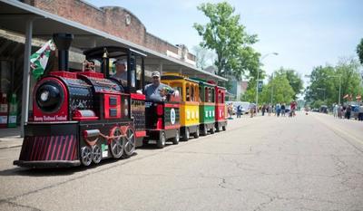 train driving on the street